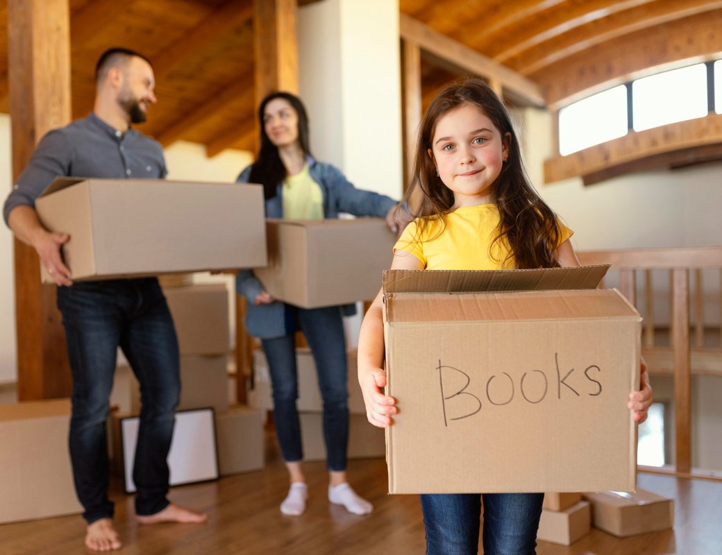 Family preparing household boxes for an international move from Egypt